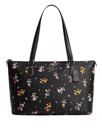 Coach crossbody bags with a printed floral pattern for a feminine touchCoach Disney X Coach Gallery Tote With Holiday Print