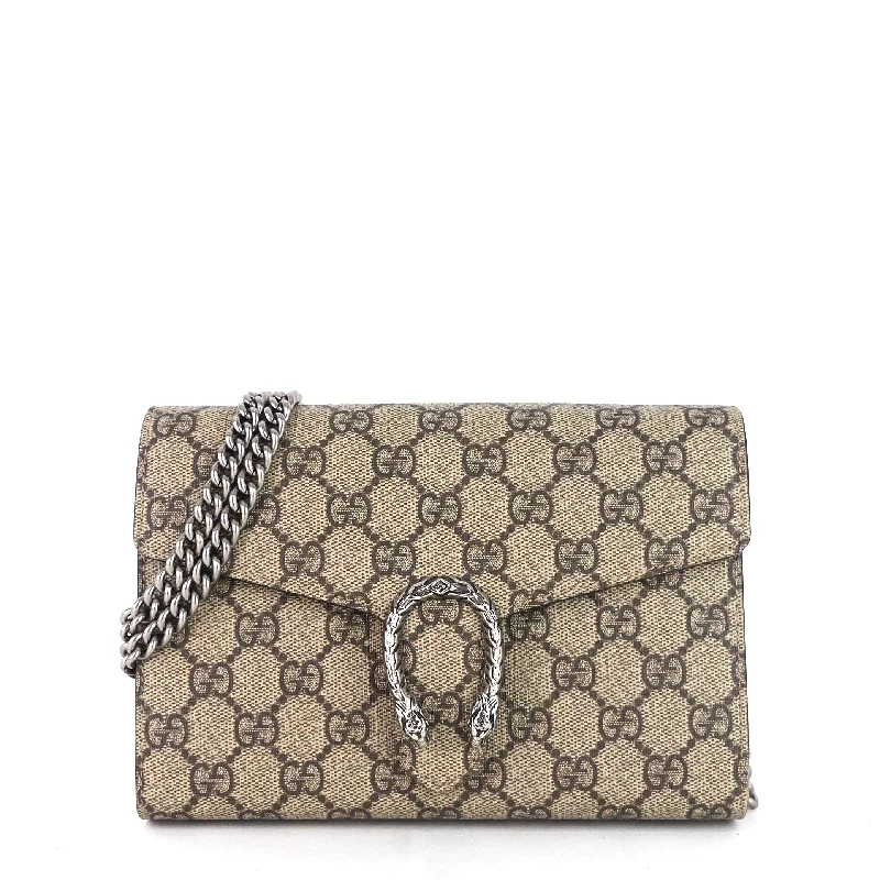 Ladies Gucci Dionysus bags in a pastel colorDionysus GG Supreme Canvas Chain Wallet Bag