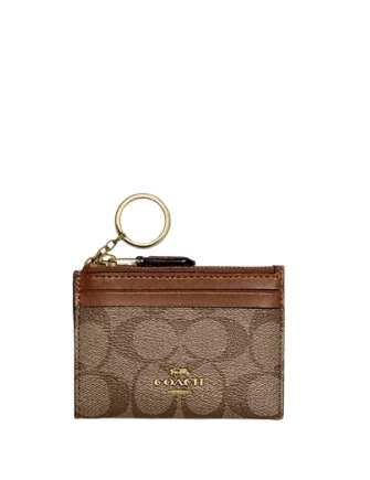 Coach Tabby bags with a classic turnlock closure for a timeless styleCoach Mini Skinny Id Case In Signature Canvas