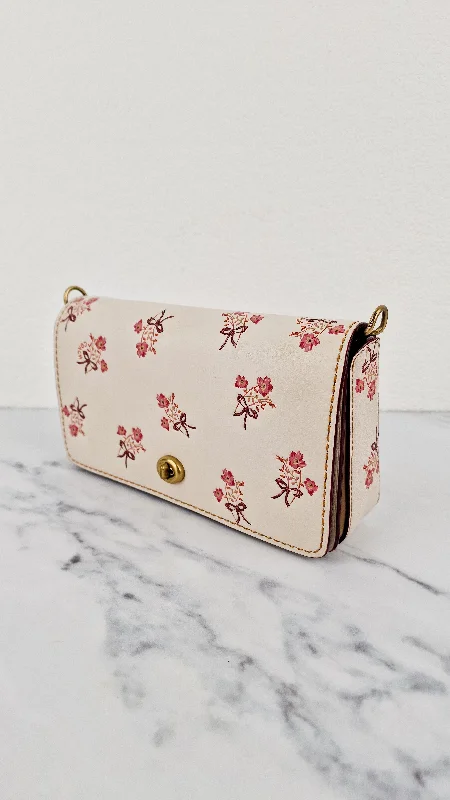 Coach bags with a patent - leather finish for a shiny and sophisticated appearanceCoach 1941 Dinky Crossbody Bag in Chalk Smooth Leather With Floral Bow Pink Flowers - Coach 28433