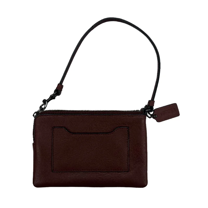 Coach Borough bags with a structured silhouette and a magnetic - snap closureWristlet Designer By Coach  Size: Small