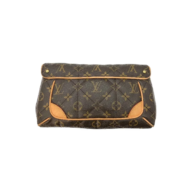 Louis Vuitton Twist bags with a contrast - colored interior for visual interestLouis Vuitton Monogram Etoile Clutch