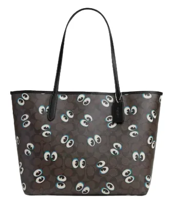 Ladies Coach Rogue bags with a star - shaped charm for a playful touchCoach City Tote In Signature Canvas With Halloween Eyes