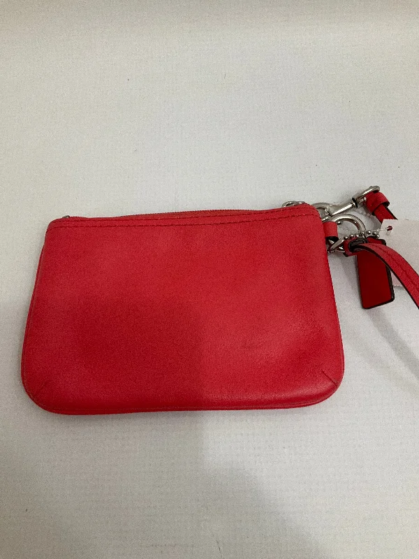 Coach Dempsey bags with a contrast - colored interior for visual interestWristlet Designer By Coach  Size: Small