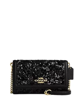 Coach Rogue bags with a monogram - embossed leather surfaceCoach Flap Crossbody