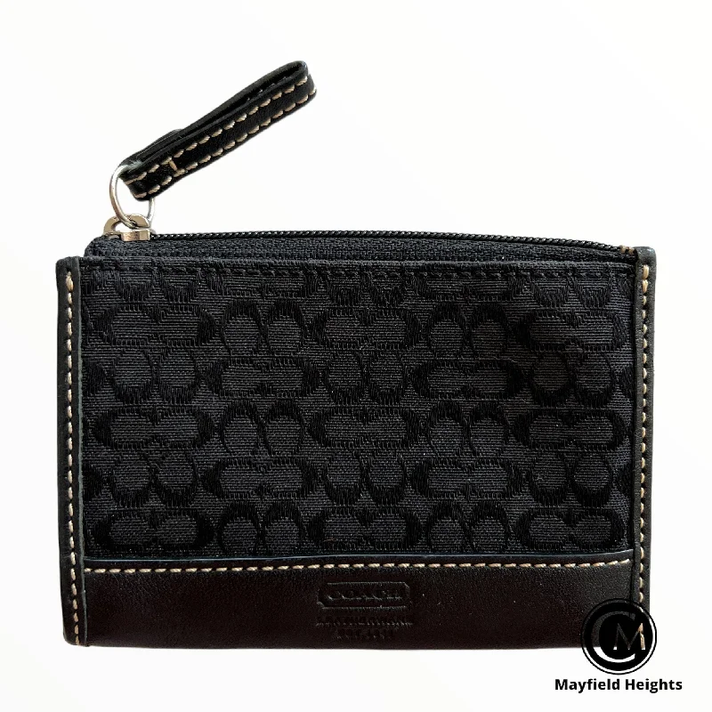 Coach Dempsey bags with a contrast - colored interior for visual interestCoin Purse Designer By Coach  Size: Small