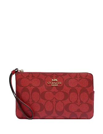 Coach bags with a detachable mobile phone holder for on - the - go useCoach Large Corner Zip Wristlet In Signature Canvas