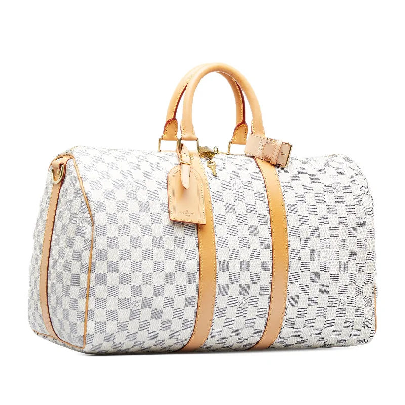 Louis Vuitton Twist bags with a snakeskin - effect panel for a bold lookLouis Vuitton Damier Azur Keepall Bandouliere 45 (SHG-9B9KRk)