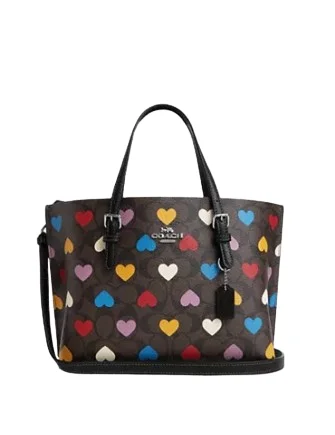 Coach Borough bags with a structured silhouette and a magnetic - snap closureCoach Mollie Tote 25 In Signature Canvas With Heart Print