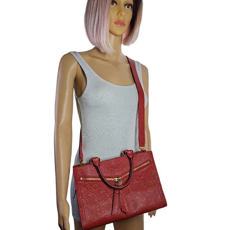 Louis Vuitton Alma bags featuring the signature top - handle designLouis Vuitton Red Monogram Empreinte Sully PM