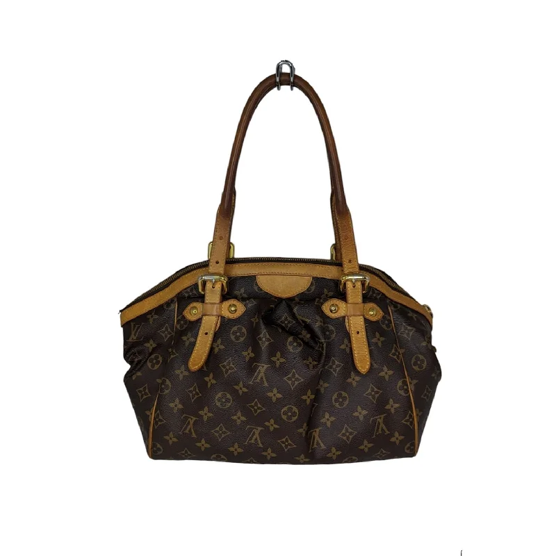 Louis Vuitton bags with a magnetic snap closure for easy accessLouis Vuitton Monogram Canvas Tivoli GM Satchel