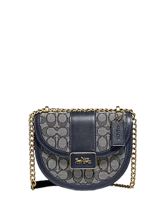 Coach Rogue bags with a monogram - embossed leather surfaceCoach Alie Saddle Bag In Signature Jacquard