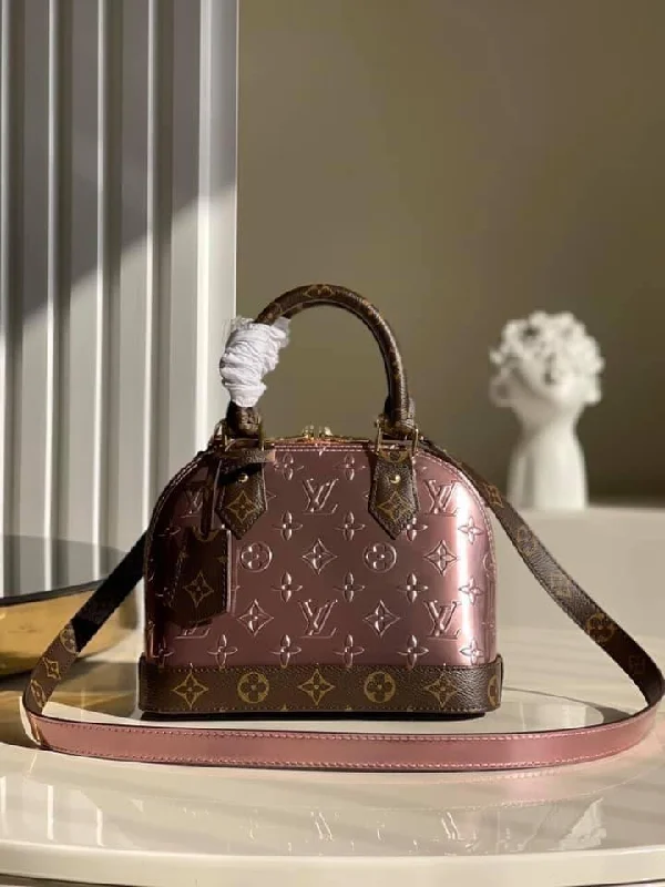 Ladies Louis Vuitton Petite Malle bags in a pastel color for a soft lookLouis Vuitton Alma BB Bag