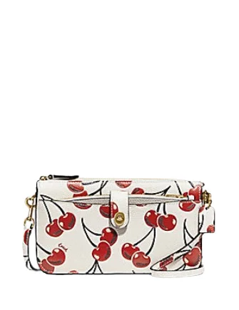 Coach bags with a detachable mobile phone holder for on - the - go useCoach Noa Pop Up Messenger With Cherry Print