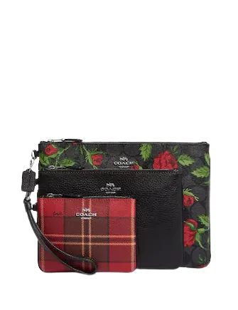 Ladies Coach Borough bags in a pastel shade for a soft and delicate appearanceCoach Pouch Trio In Signature Canvas With Vintage Rose Print And Tartan Plaid Print