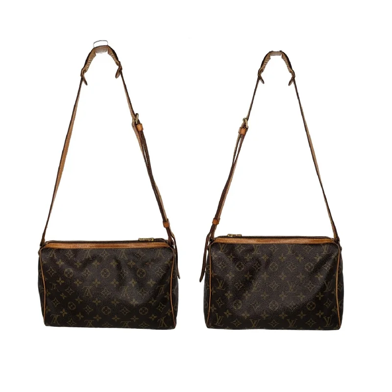 Ladies Louis Vuitton handbags with a detachable coin purse insideLouis Vuitton Vintage Monogram Tulle Lee Shoulder Bag