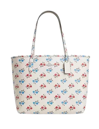 Coach Rogue bags featuring the signature C - hardware for a branded lookCoach City Tote Bag With Floral Print