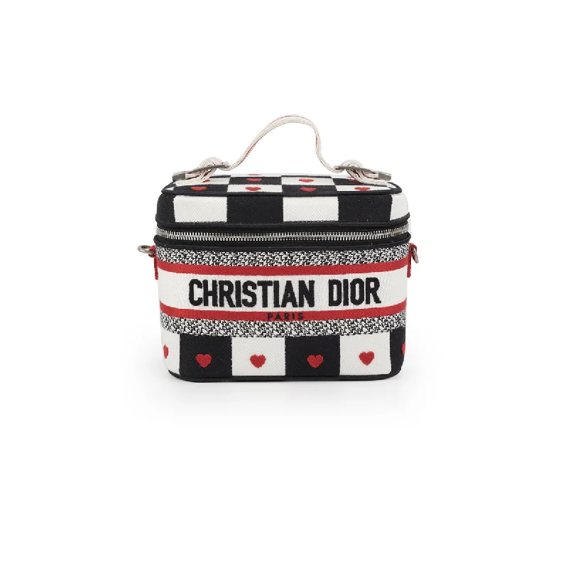 Christian Dior Saddle bags with a studded trim for a bold lookDior Diortravel Small Vanity Case Canvas Dioramour