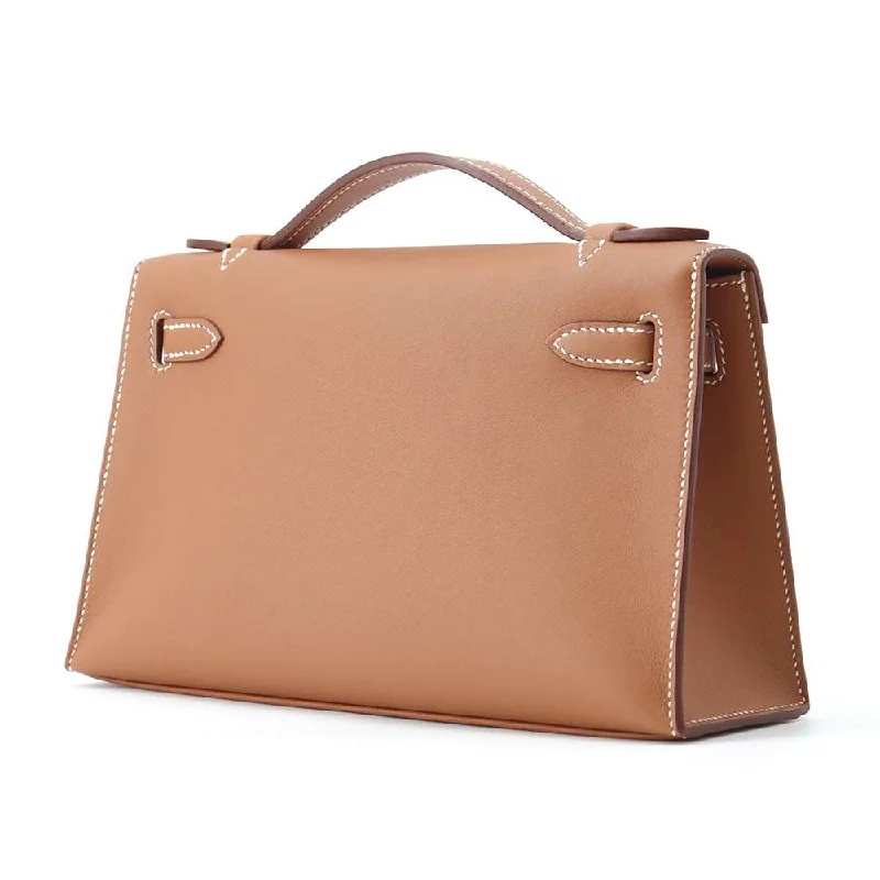 Compact Hermes Herbag Zip for Effortless CarryingHERMES PochetteKelly Gold Swift Leather