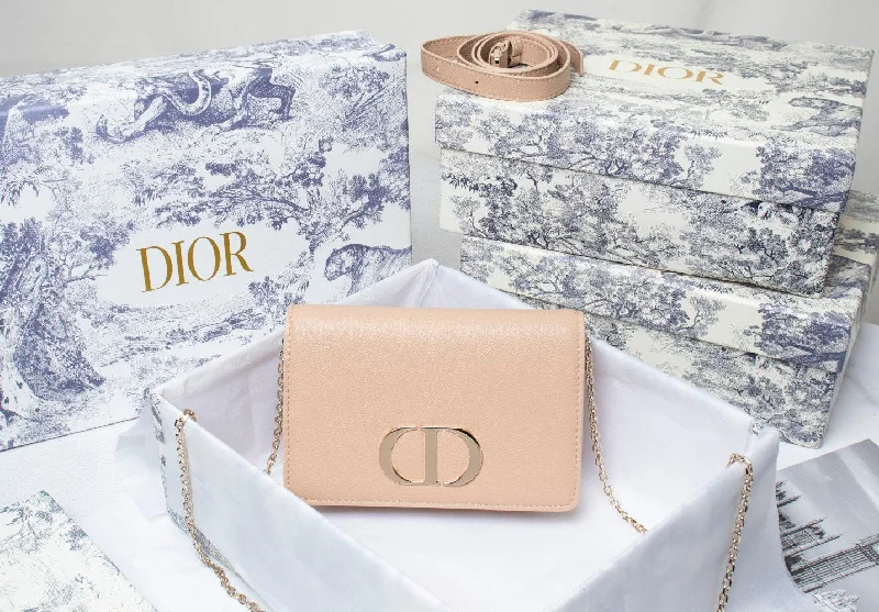 Christian Dior bags with a side - pocket for holding a water bottleGlitzyBags - Designer bags by Dior 132