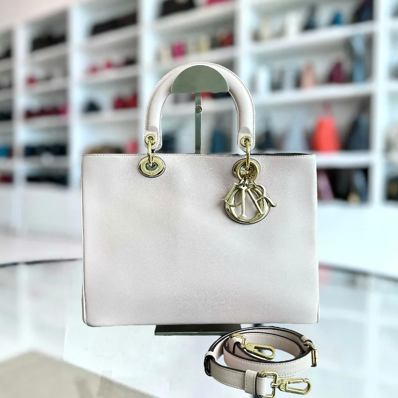 Christian Dior Saddle bags with a patent leather finish for a shiny lookDiorissimo Medium 31CM Smooth Calfskin Powder Pink GHW