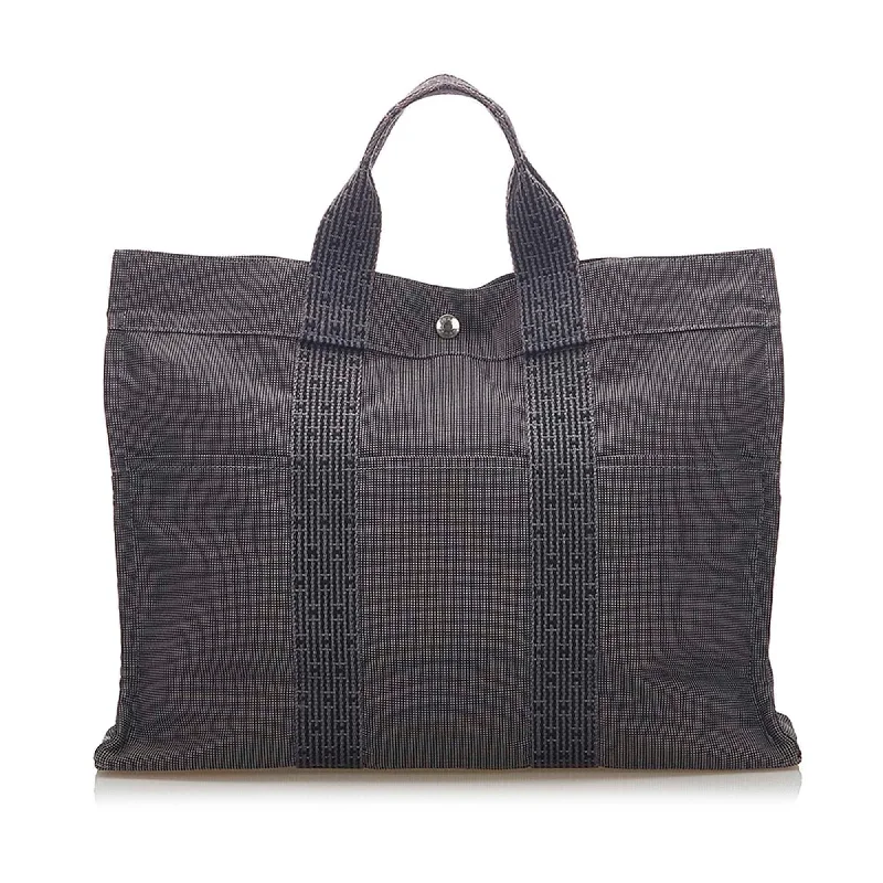 Dark - Hued Hermes Bags for a Sophisticated and Timeless PresenceHermes Herline MM Tote Bag (SHG-17067)