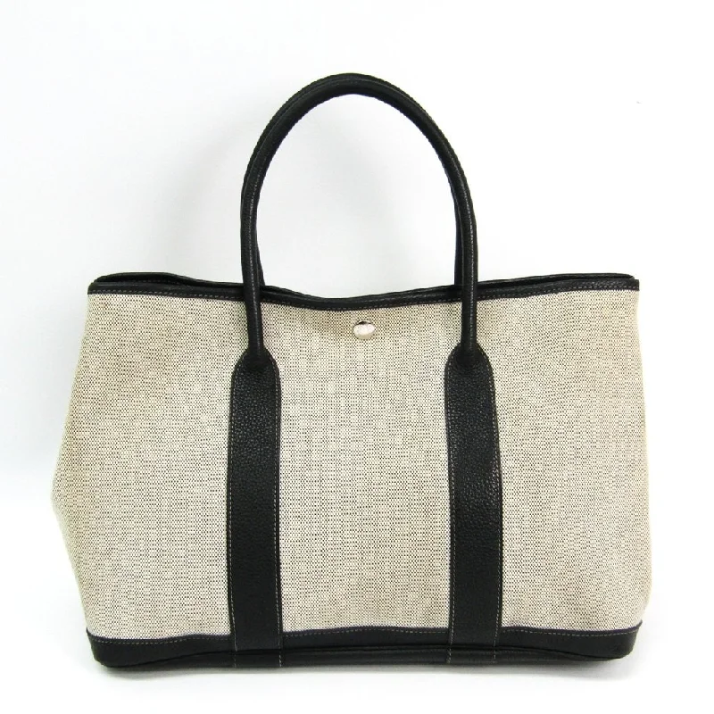 Hermes Victoria Bags with Signature Turnlock ClosuresHermes Natural/Black Canvas Garden Party 36 Tote (SHA11055)