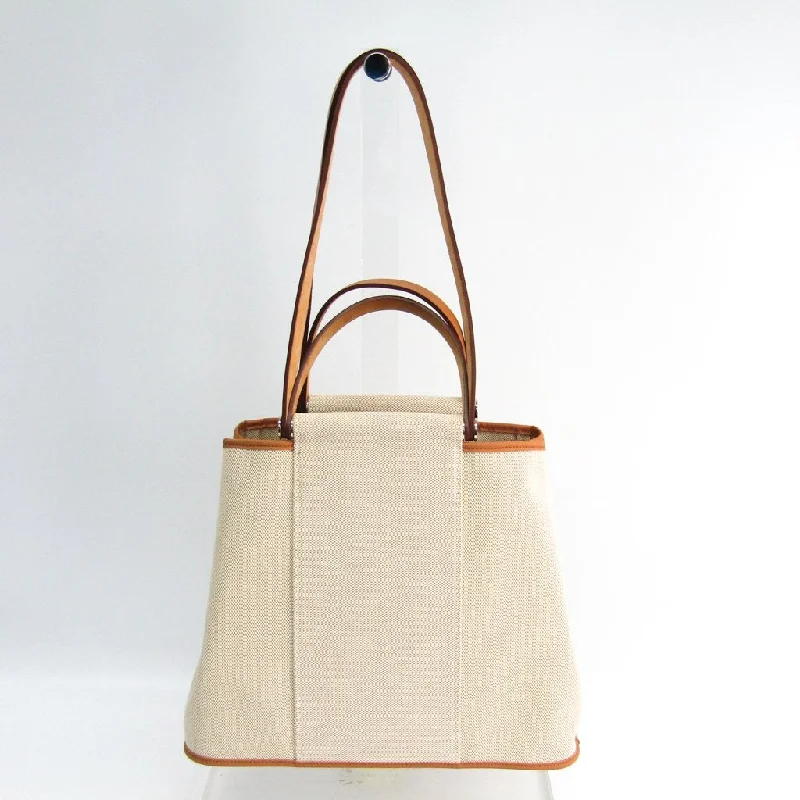 Hermes Kellydoll Bags for a Playful and Chic LookHermes Natural Canvas Cabag PM Tote (SHA-43859)