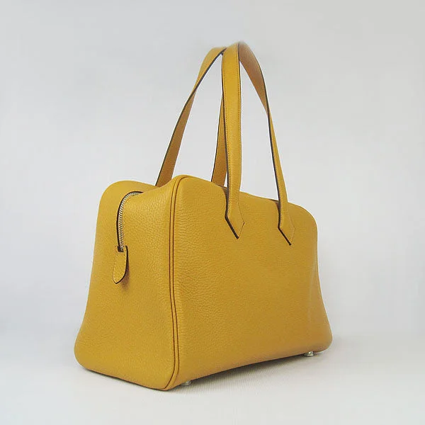 Seasonal - Exclusive Hermes Bags for Summer GetawaysHermes Togo leather handbag H2802 yellow