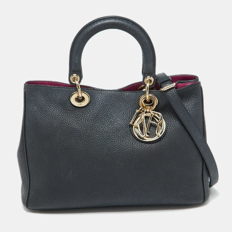 Christian Dior handbags with a snap - button closure and a decorative buckleDIOR Black Leather Medium issimo Shopper Tote