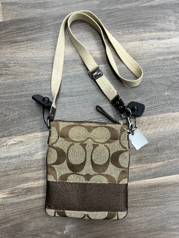 Coach crossbody bags with a woven leather strap for a unique textureCrossbody Designer By Coach  Size: Medium