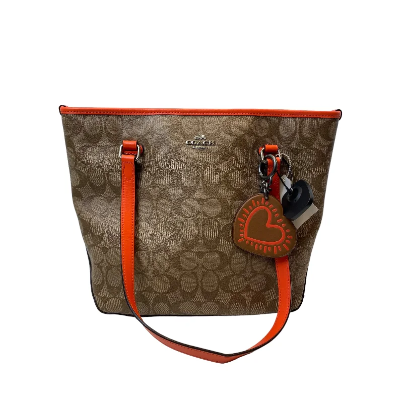 Coach bags with a zippered interior pocket for separating itemsHandbag Designer By Coach  Size: Medium